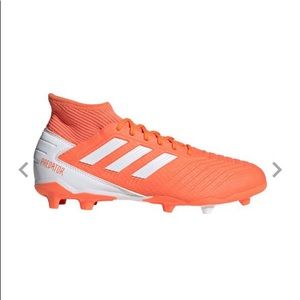 Orange Adidas cleats